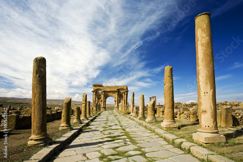 Algeria. Timgad (ancient Thamugadi or Thamugas). Decumanus street and surrounding colonnade terminated Trajan's Arch