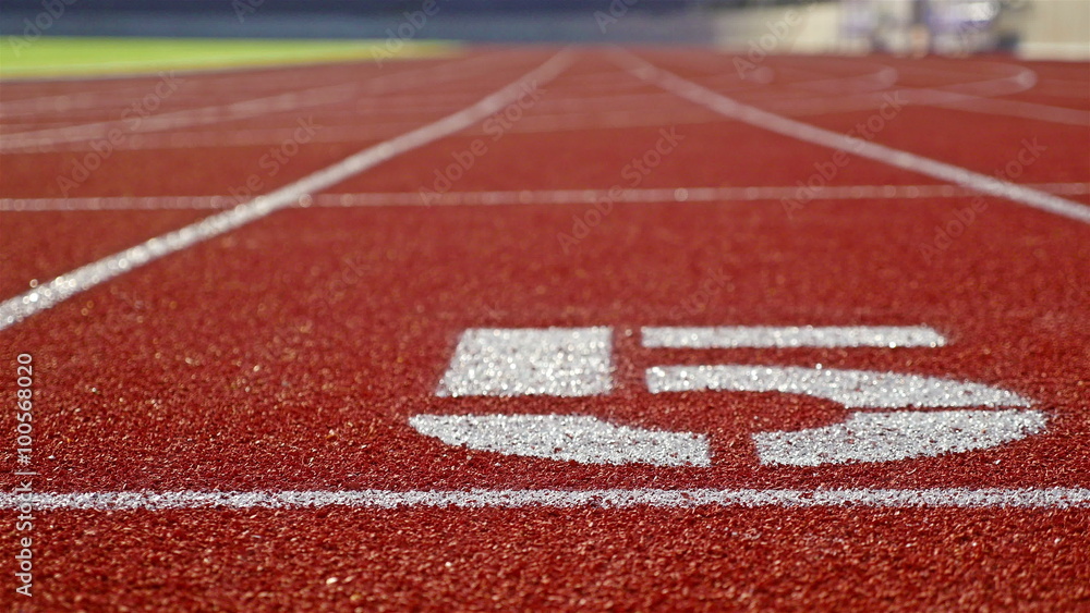 Running track with lane five on a stadium