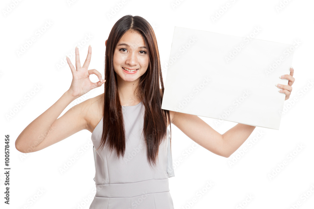 Beautiful young Asian woman show OK with blank sign Beautiful young Asian woman show OK with blank sign