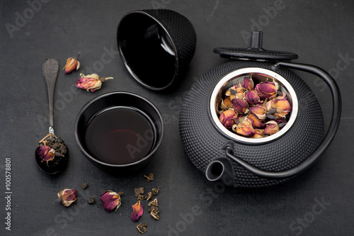 Green tea with rose flowers Asian style. Horizontal.