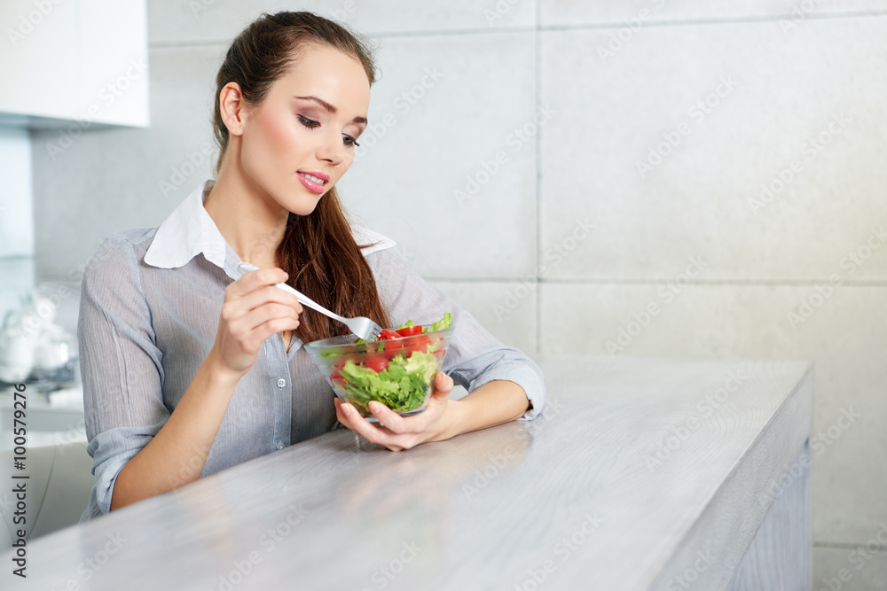 Beautiful Young Woman Eating Vegetable Salad .Dieting concept.He Beautiful Young Woman Eating Vegetable Salad .Dieting concept.He