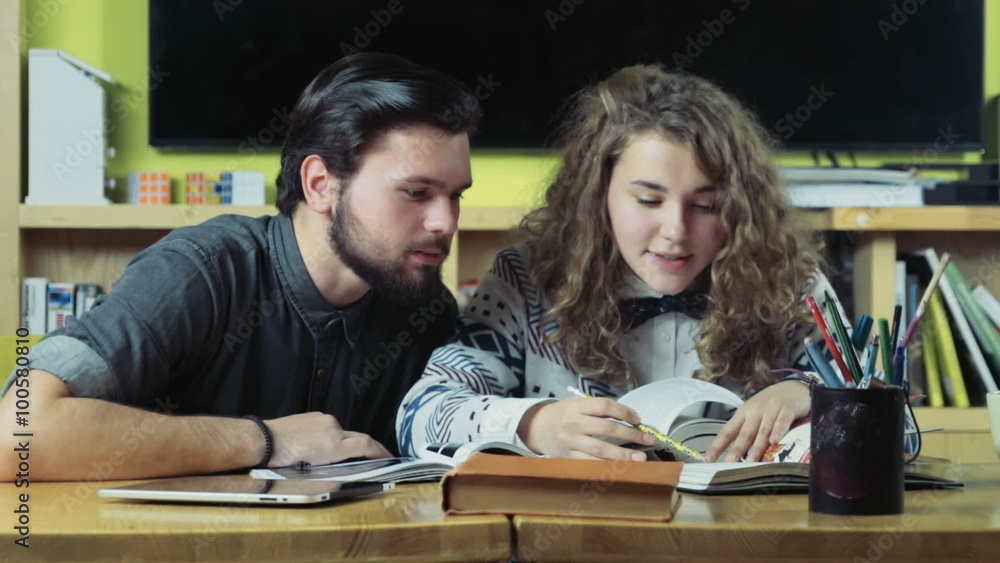 couple of students studying in the class room slow motion couple of students studying in the class room slow motion