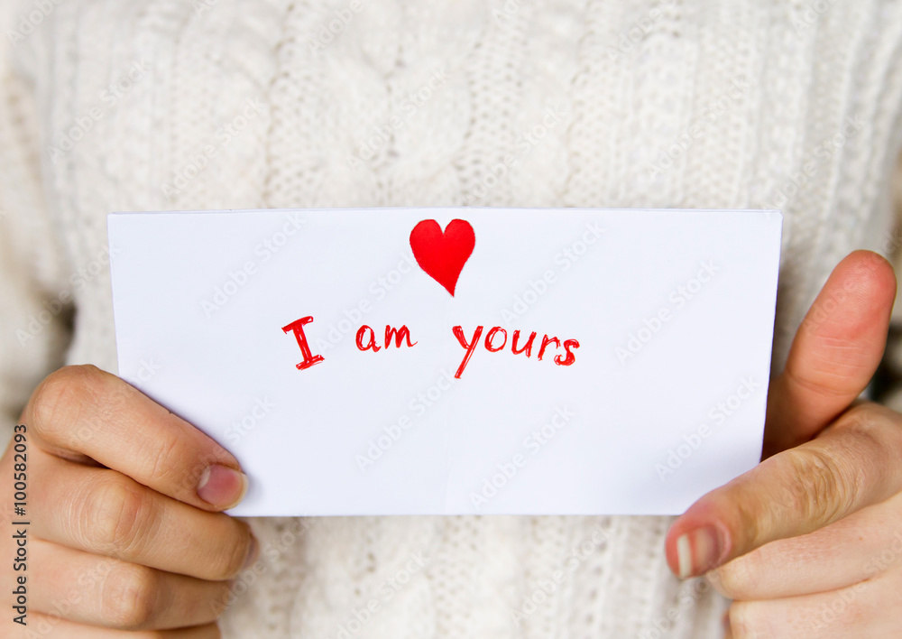 Postcard for Valentines day in girl's hands Postcard for Valentines day in girl's hands