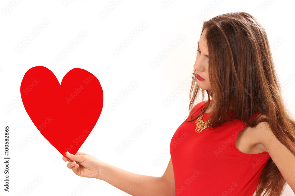 red dress with red heart Valentine's Day card in hands red dress with red heart Valentine's Day card in hands