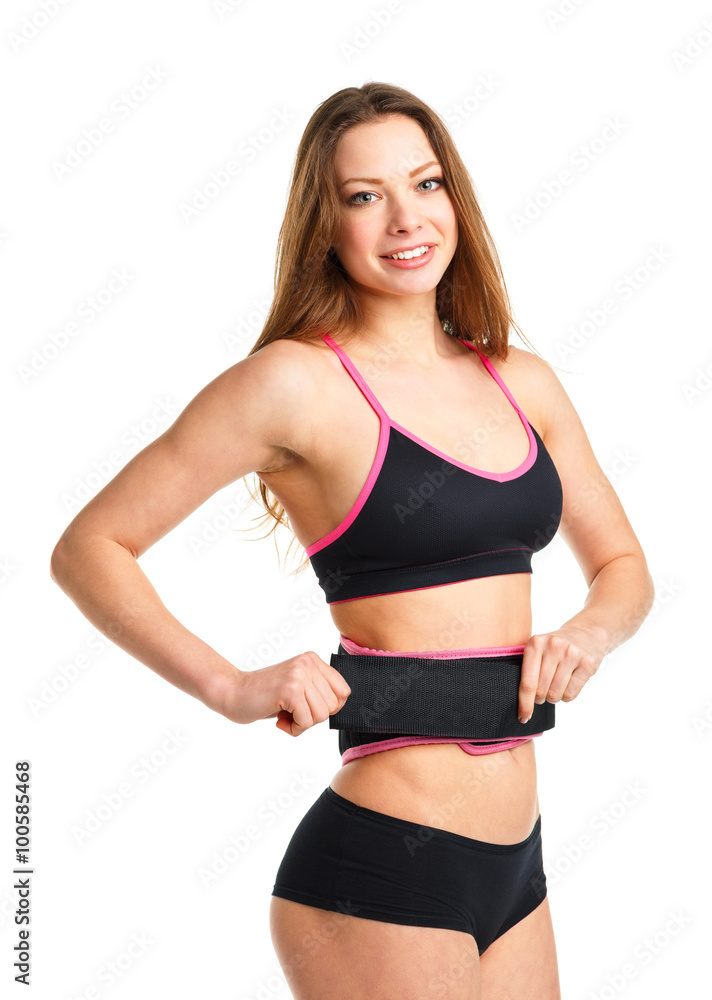 Obraz premium Happy athletic woman doing sport exercise, isolated on white