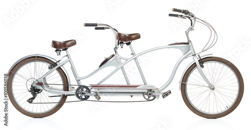 Photos Retro styled tandem bicycle isolated on a white