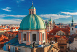 Aerial view over Old Town in Prague with domes of churches, Bell tower of the Old Town Hall, Powder Tower, Czech Republic 
