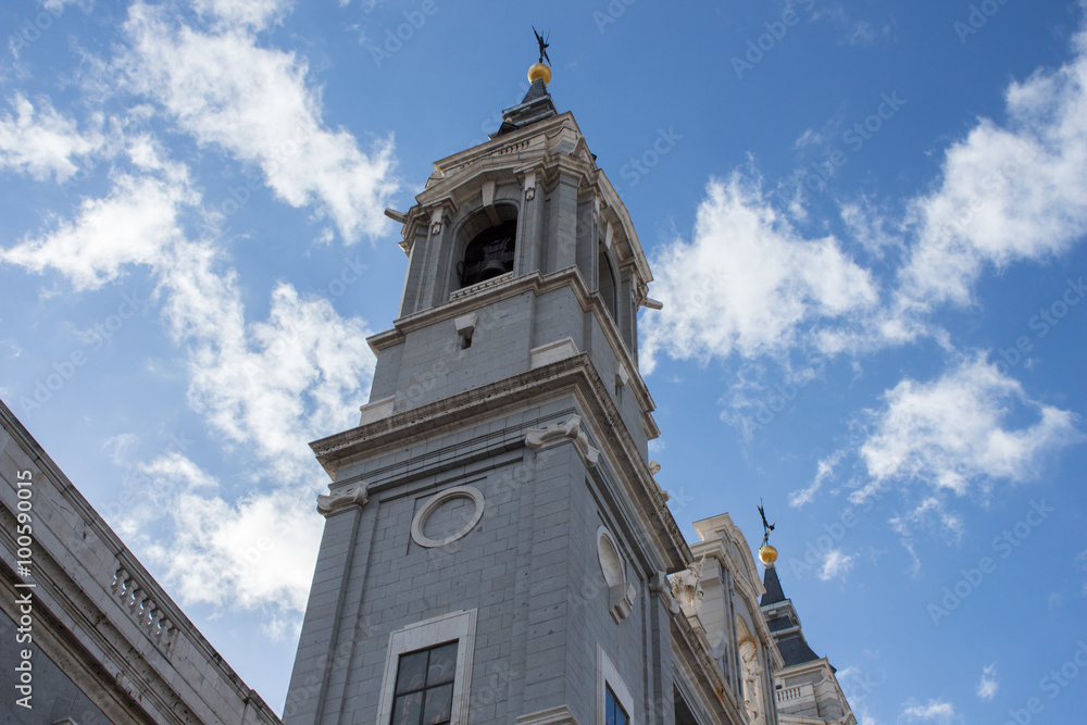 Facade of Almudena Cathedral in the center of Madrid, Spain.