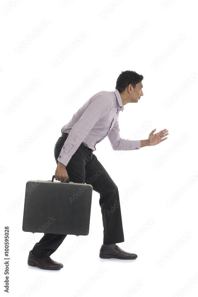 An businessman running away isolated on white background An businessman running away isolated on white background