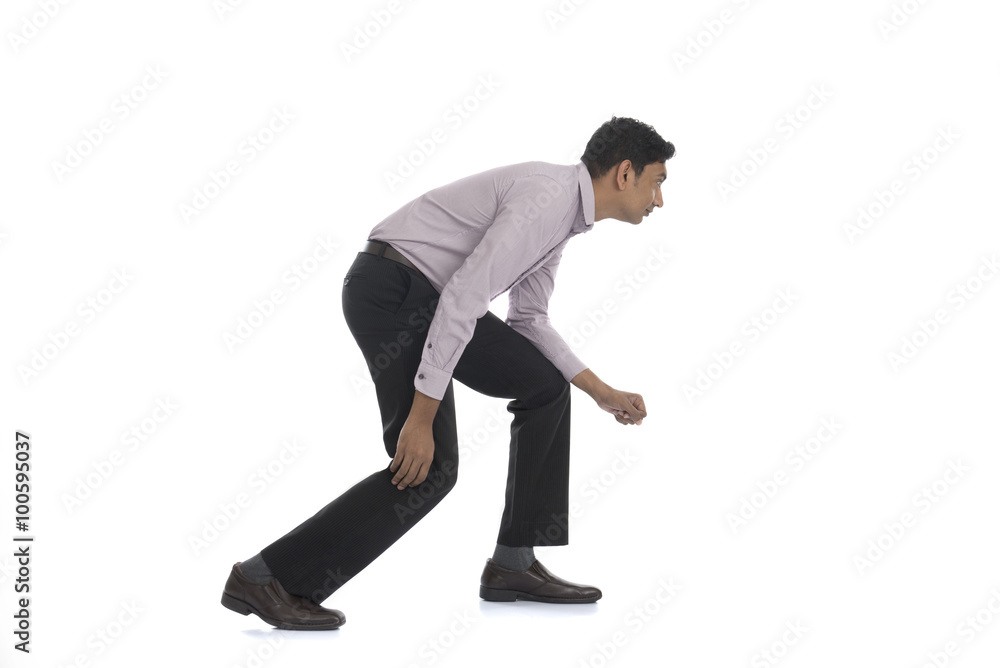 An businessman running away isolated on white background An businessman running away isolated on white background