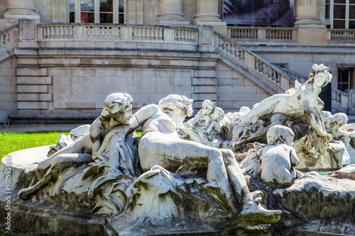 PARIS, FRANCE - AUGUST 30, 2015: Paris Park bronze sculptures of famous person. photo
