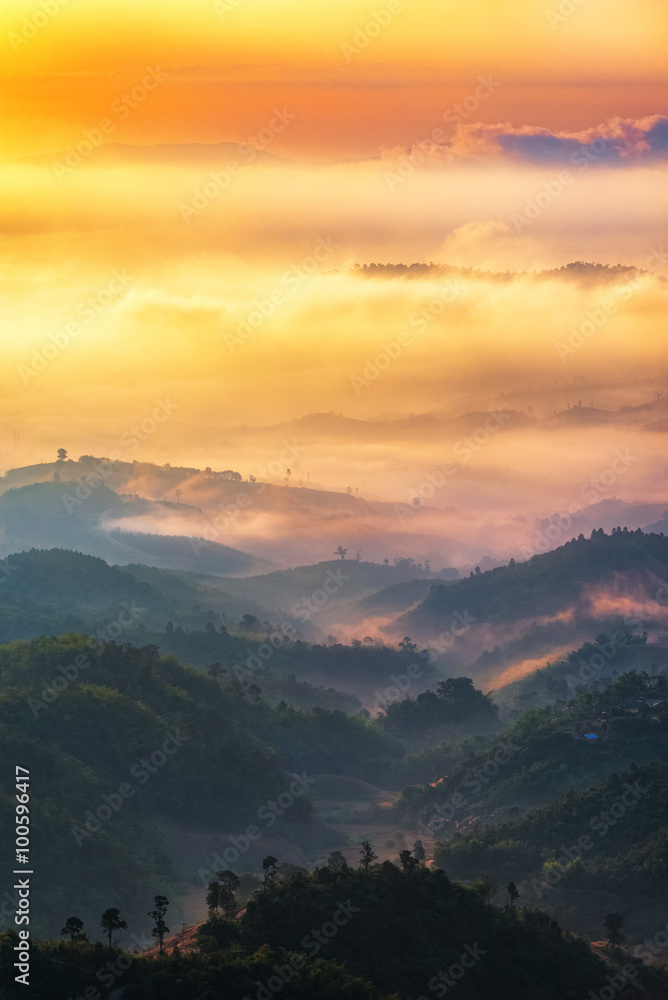 Sunrise view of mountain and mist in morning at Doi Hua Mae Kham, Chiangrai province,Thailand.