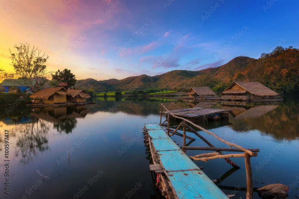 Fototapeta premium Sunrise view at lake with reflection in water.