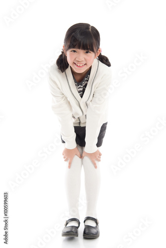 Beautiful asian girl standing on white background