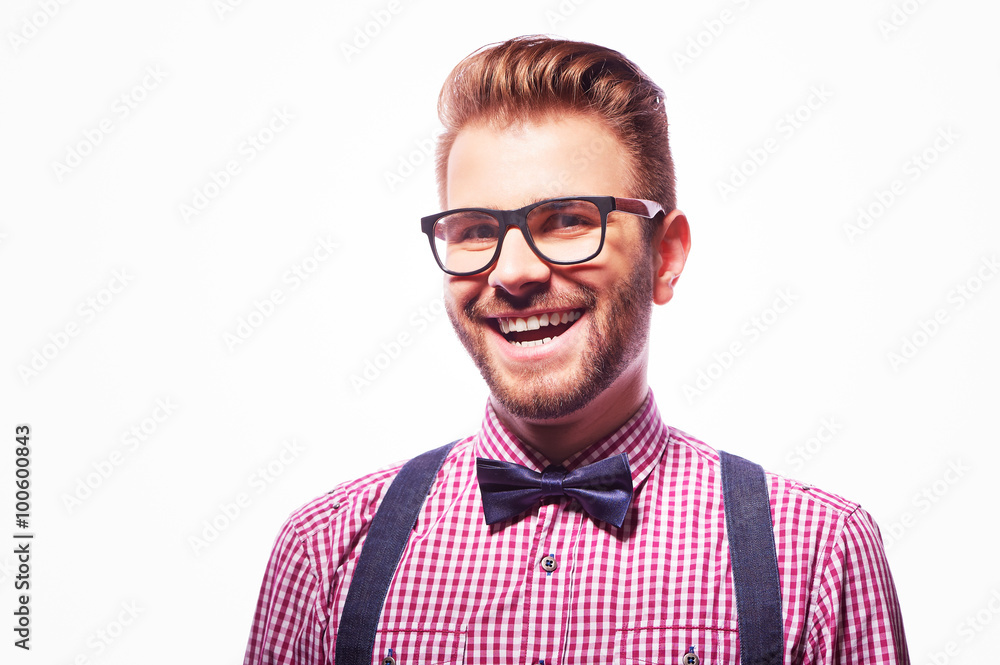 Closeup of happy smiling guy looking at camera isolated on white Closeup of happy smiling guy looking at camera isolated on white