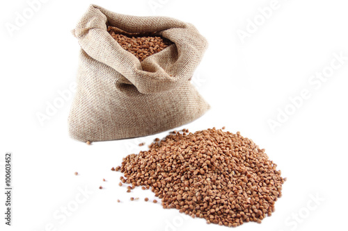 Buckwheat groats in the Burlap sack, isolated on the white background