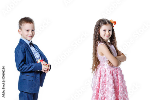 boy gives a girl flowers on the day of St . Valentine