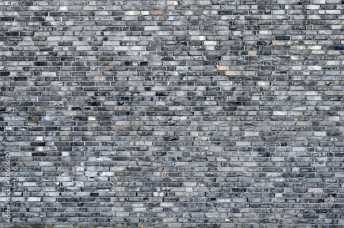 Repeating grey brick wall background