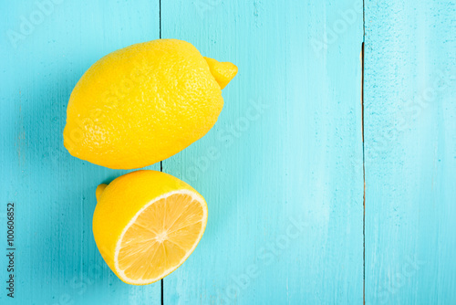 Fresh Yellow Lemons On Turquoise Table