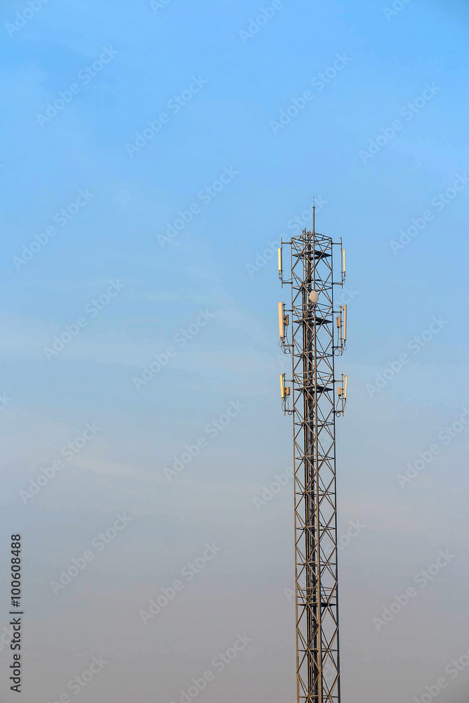 Antenna and telecommunication tower in blue sky background