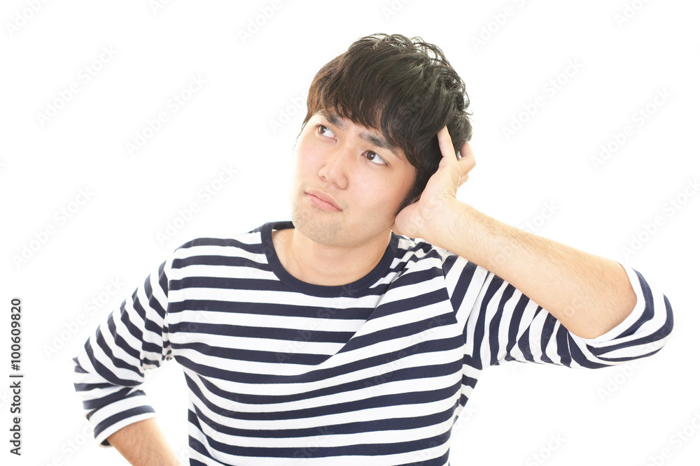 疲れた表情の男性 疲れた表情の男性