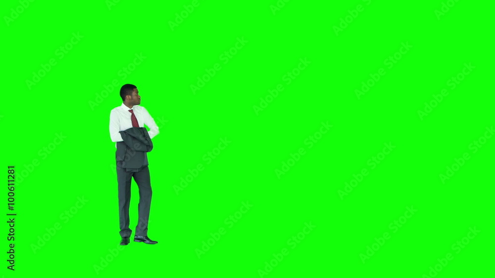 Businessman with jacket in hand walking Businessman with jacket in hand walking