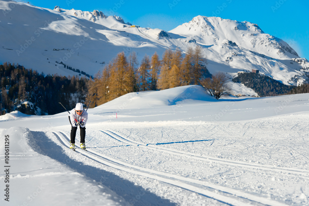 Woman practicing cross-country skiing