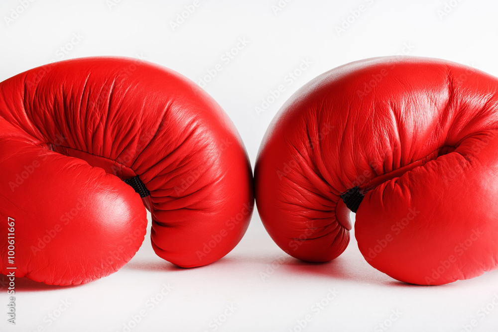 A pair of red boxing gloves. Sports concept. - obrazy, fototapety, plakaty 