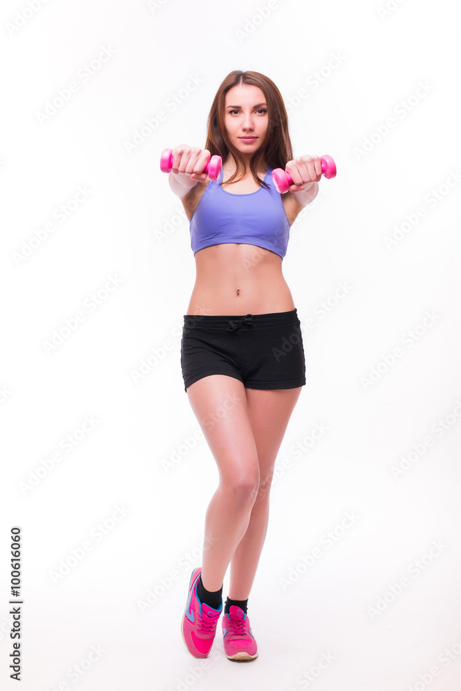 Active sportive athletic woman with dumbbells pumping up muscles biceps concept fitness sport training lifestyle Active sportive athletic woman with dumbbells pumping up muscles biceps concept fitness sport training lifestyle