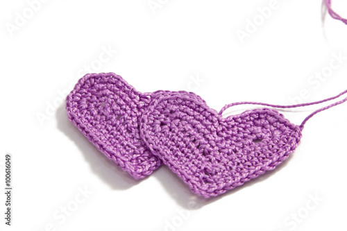 Crochet little hearts with interwoven threads