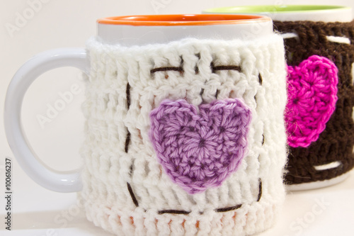 Couple mugs knitted hot water bottle decorated with pink heart