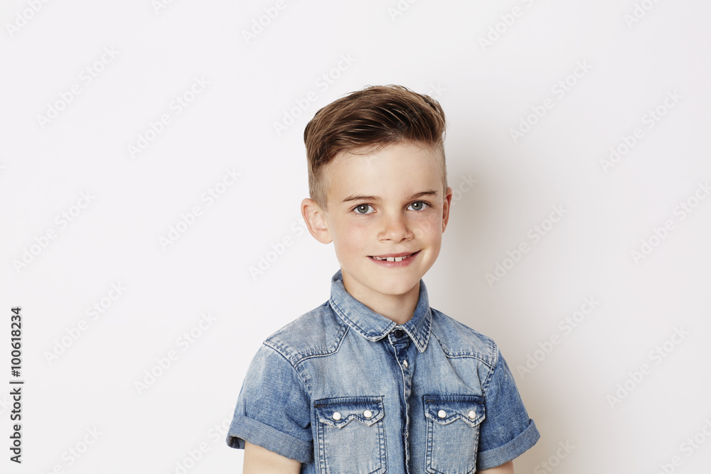 Cool young kid smiling in denim shirt, smiling Cool young kid smiling in denim shirt, smiling