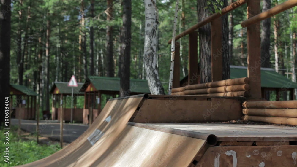 man doing a trick on a skateboard on the ramp man doing a trick on a skateboard on the ramp