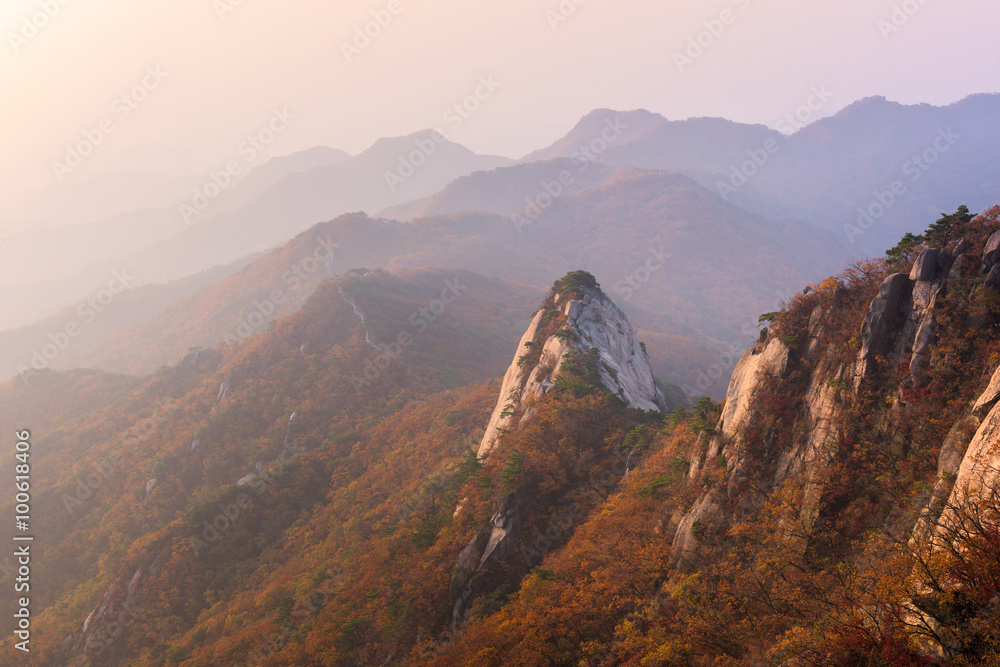 Fototapeta premium sunrise of Baegundae peak, Autumn Season at Bukhansan mountains