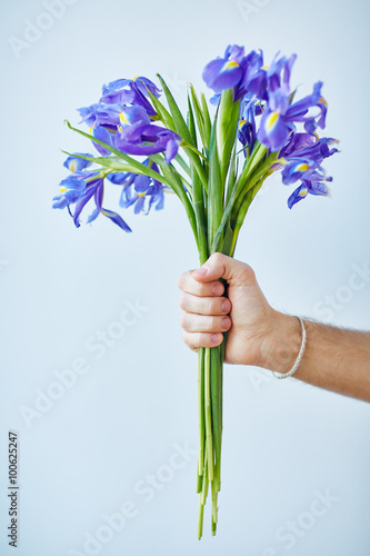 Giving iris bouquet