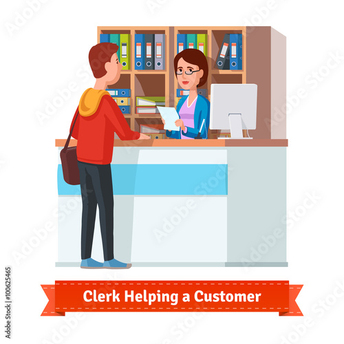 Assistant clerk working with customer