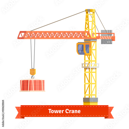 Tower crane lifting building materials on the hook