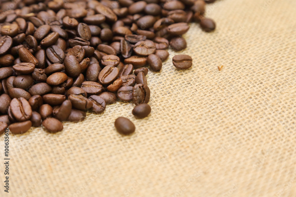 coffee beans on a burlap sack coffee beans on a burlap sack