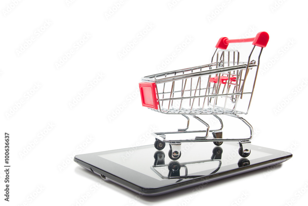 Online shopping concept - Empty Shopping Cart, laptop and tablet pc, smartphone isolated on white background. Copy space for text.