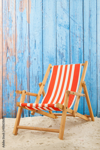 Leinwand Poster Red striped beach chair