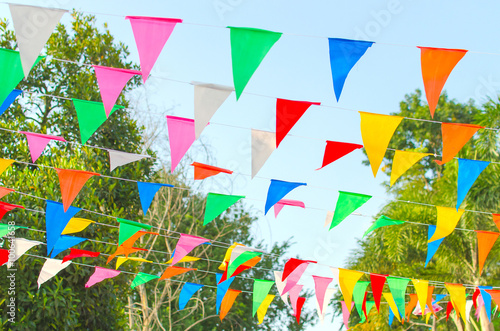colorful pennant in leaves background