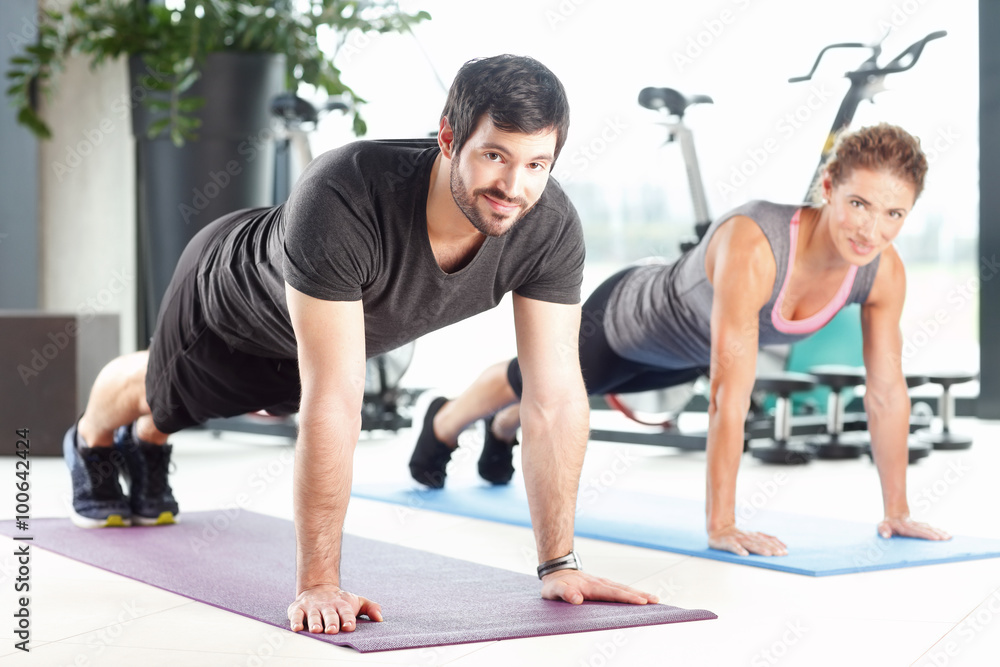 Workout at fitness club Workout at fitness club
