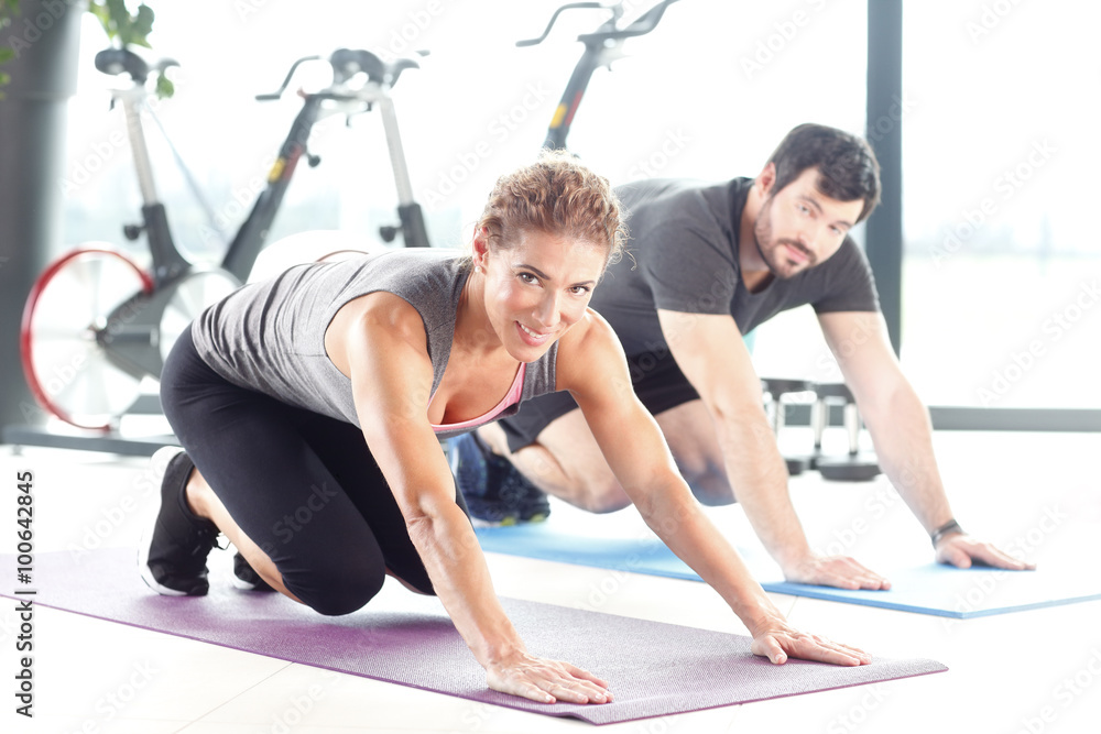 Obraz premium Workout at fitness club
