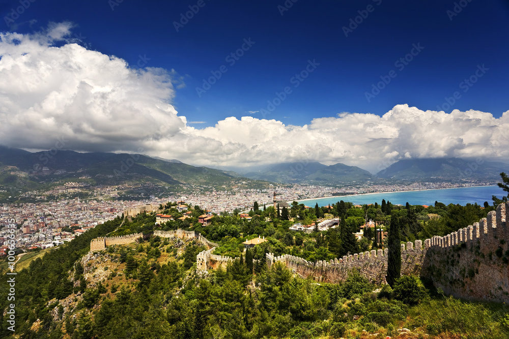 Turkey. Alanya. Aerial view the Citadel of Alanya (Alanya Kalesi - remains of fortified walls). There is a modern city in background