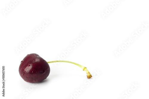 A cherry isolated on white background