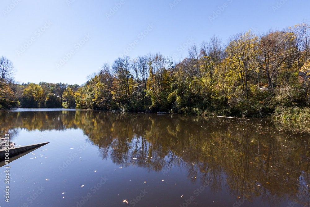 Fall Colors Reflect on Still Water