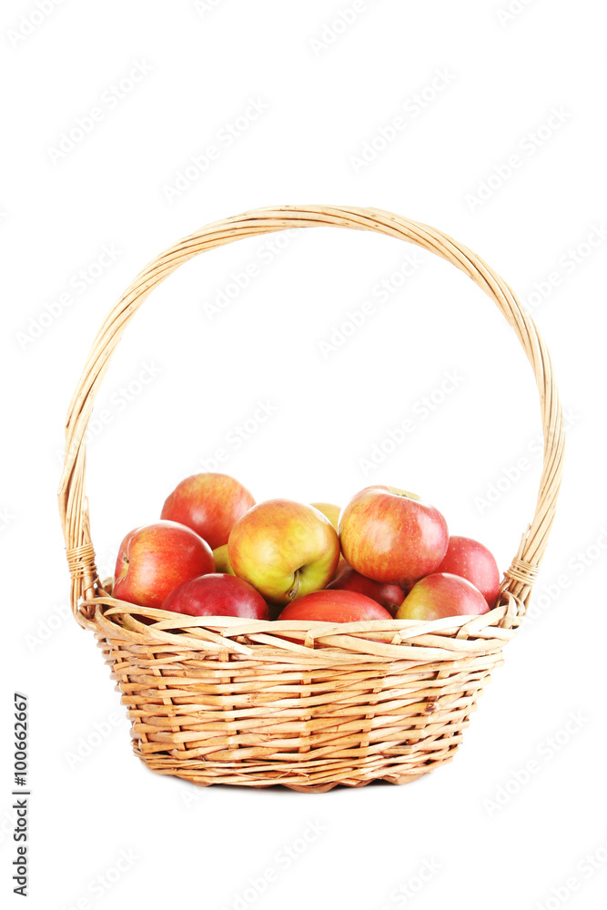 Fresh apples in basket isolated on a white Fresh apples in basket isolated on a white