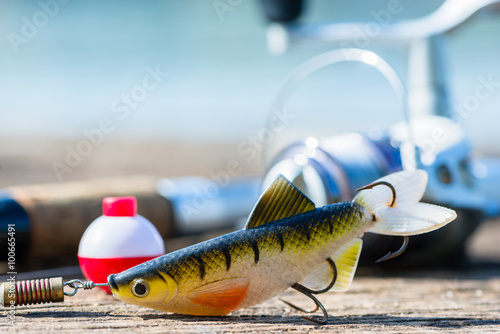Fotografia, Obraz fishing rod, lure, and hook on jetty