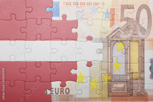 puzzle with the national flag of latvia and euro banknote
