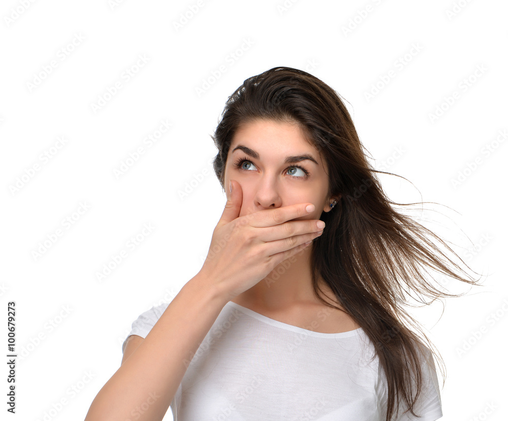 beautiful young woman covering her mouth with hand beautiful young woman covering her mouth with hand